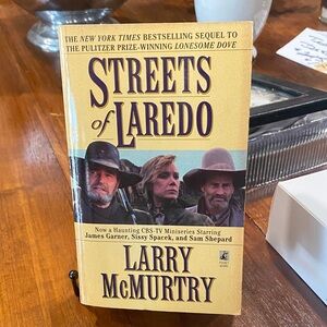 Streets of Laredo by Larry McMurtry - Yellow Paperback Novel